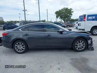 2016 Mazda 6 i Sport with VIN JM1GJ1U53G1409301, listed as a IAAI auction lot 42057930 with 100,434 mi miles and . Bid and sale history available at DreamBid. Image 14.