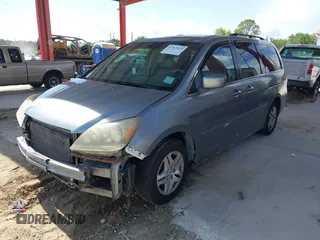 2007 Honda Odyssey EX-L z VIN 5FNRL38657B116038, wystawiony jako IAAI lot #42365429 z przebiegiem 177 518 mil mil oraz . Historia ofert i sprzedaży dostępna na DreamBid. Obrazek 2.