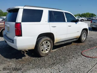 2015 Chevrolet Tahoe LT with VIN 1GNSCBKC4FR171297, listed as a IAAI auction lot 42017924 with 230,165 mi miles. Bid and sale history available at carsss.com. Image 4.