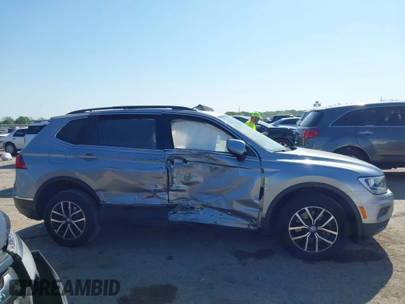 2021 Volkswagen Tiguan SE with VIN 3VV3B7AX0MM026064, listed as a IAAI auction lot 42038137 with 18,526 mi miles and . Bid and sale history available at DreamBid. Image 13.
