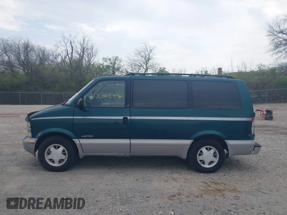 1997 Chevrolet Astro with VIN 1GNDM19W9VB205001, listed as a IAAI auction lot 42002535 with 136,734 mi miles. Bid and sale history available at carsss.com. Image 14.