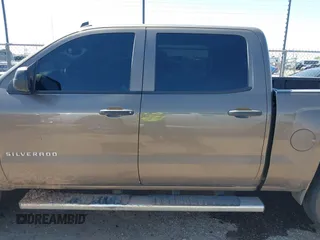2014 Chevrolet Silverado 1500 LT with VIN 3GCPCREC0EG168589, listed as a IAAI auction lot 42001234 with 133,880 mi miles and . Bid and sale history available at DreamBid. Image 14.