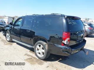 2013 Chevrolet Suburban LT with VIN 1GNSCJE0XDR255326, listed as a IAAI auction lot 41969643 with 176,494 mi miles. Bid and sale history available at carsss.com. Image 3.