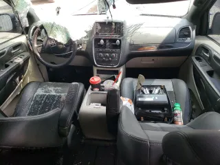 2018 Dodge Grand Caravan SXT with VIN 2C4RDGCG0JR238404, listed as a Copart auction lot 52288385 with 140,345 mi miles and Non Repairable. Bid and sale history available at DreamBid. Image 8.
