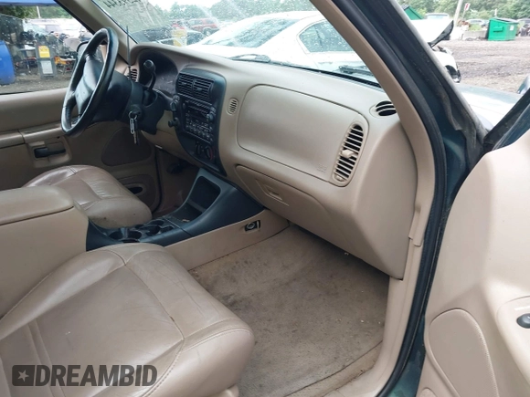 1999 Ford Explorer XLT with VIN 1FMZU34E7XZB53284, listed as a IAAI auction lot 42593344 with 93,146 mi miles and . Bid and sale history available at DreamBid. Image 5.