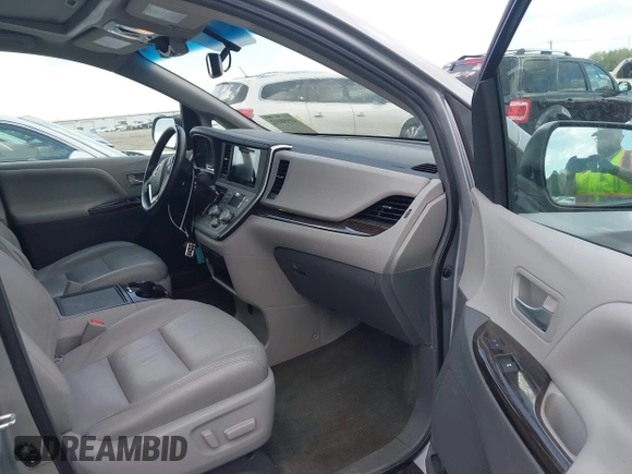 2015 Toyota Sienna XLE with VIN 5TDYK3DC7FS659864, listed as a IAAI auction lot 41958112 with 121,257 mi miles and . Bid and sale history available at DreamBid. Image 5.