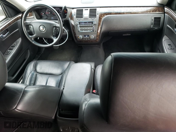 2009 Cadillac DTS Professional Limousine z VIN 1GEEK90Y89U550148, wystawiony jako Copart lot #79937134 z przebiegiem 25 996 mil mil oraz Szkody całkowita. Historia ofert i sprzedaży dostępna na DreamBid. Obrazek 8.