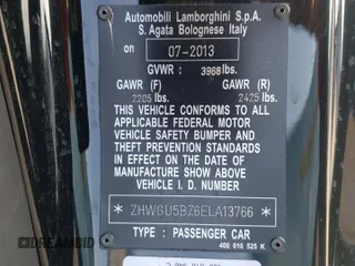 2014 Lamborghini Gallardo z VIN ZHWGU5BZ6ELA13766, wystawiony jako Copart lot #64172354 z przebiegiem 22 043 mil mil oraz Szkody całkowita. Historia ofert i sprzedaży dostępna na DreamBid. Obrazek 13.