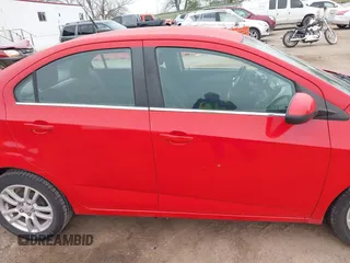 2012 Chevrolet Sonic LT with VIN 1G1JC5SH7C4133484, listed as a IAAI auction lot 42076809 with 100,506 mi miles and . Bid and sale history available at DreamBid. Image 13.