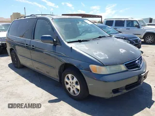 2004 Honda Odyssey EX-L with VIN 5FNRL18964B123915, listed as a IAAI auction lot 42855762 with 168,485 mi miles and . Bid and sale history available at DreamBid. Image 1.