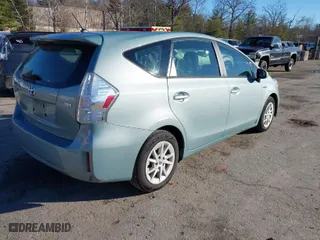 2014 Toyota Prius v Two with VIN JTDZN3EU2EJ006518, listed as a IAAI auction lot 41224398 with 90,907 mi miles. Bid and sale history available at carsss.com. Image 4.