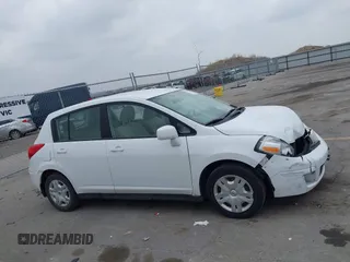 2011 Nissan Versa S with VIN 3N1BC1CPXBL485951, listed as a IAAI auction lot 42011943 with 222,665 mi miles and . Bid and sale history available at DreamBid. Image 14.