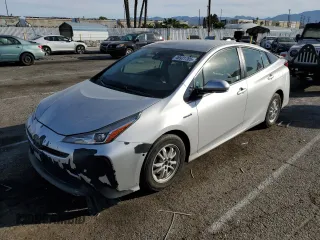 2020 Toyota Prius L Eco with VIN JTDKARFU0L3109887, listed as a Copart auction lot 46931785 with 122,909 mi miles and Salvage Title. Bid and sale history available at DreamBid. Image 1.