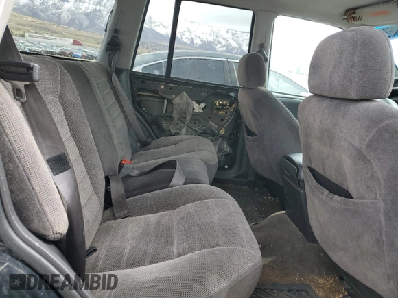 1996 Jeep Grand Cherokee with VIN 1J4EZ58S8TC106529, listed as a Copart auction lot 50163965 with 226,951 mi miles and Salvage title. Bid and sale history available at DreamBid. Image 10.
