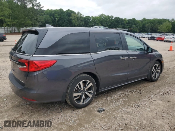 2023 Honda Odyssey Touring with VIN 5FNRL6H86PB024066, listed as a Copart auction lot 58414575 with 29,827 mi miles and Salvage title. Bid and sale history available at DreamBid. Image 3.
