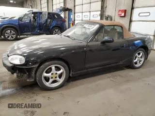 1999 Mazda MX-5 Miata z VIN JM1NB3536X0126281, wystawiony jako Copart lot #75179234 z przebiegiem 47 483 mil mil oraz Szkoda całkowita • Salvage title. Historia ofert i sprzedaży dostępna na DreamBid. Obrazek 1.