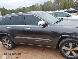 2014 Jeep Grand Cherokee Overland с VIN 1C4RJFCG6EC570431, выставлен на аукционе IAAI как лот 41935177 с пробегом 182 905 миль миль и . История ставок и продаж доступна на DreamBid. Изображение 13.