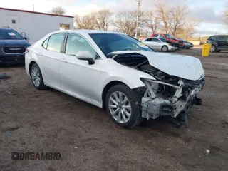 2019 Toyota Camry LE z VIN 4T1B11HK1KU804266, wystawiony jako IAAI lot #41226403 z przebiegiem 91 163 mil mil oraz . Historia ofert i sprzedaży dostępna na DreamBid. Obrazek 1.