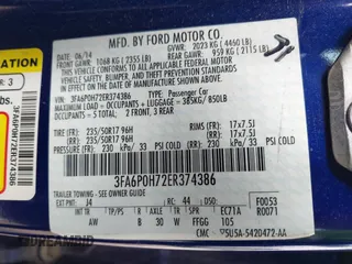 2014 Ford Fusion SE with VIN 3FA6P0H72ER374386, listed as a IAAI auction lot 41938833 with 140,095 mi miles. Bid and sale history available at carsss.com. Image 9.