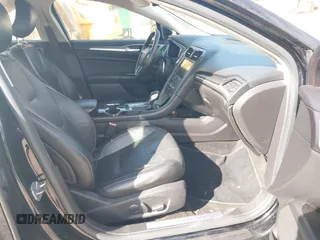 2016 Ford Fusion Titanium with VIN 3FA6P0K92GR284491, listed as a IAAI auction lot 41824323 with 148,016 mi miles. Bid and sale history available at carsss.com. Image 5.