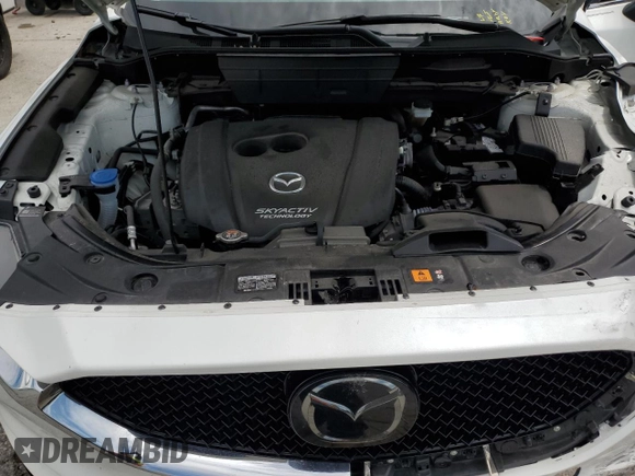 2018 Mazda CX-5 Grand Touring with VIN JM3KFBDM7J0302037, listed as a Copart auction lot 63021845 with Not provided miles and Salvage title. Bid and sale history available at DreamBid. Image 12.