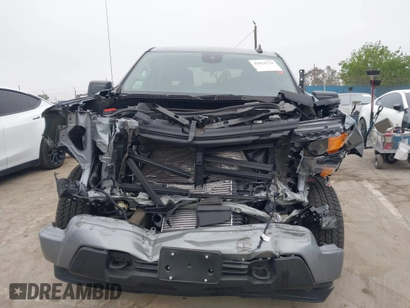 2024 Chevrolet Silverado 1500 Custom with VIN 3GCPABEK7RG311970, listed as a IAAI auction lot 42024754 with 7,976 mi miles and . Bid and sale history available at DreamBid. Image 13.