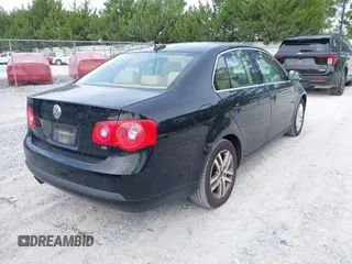 2005 Volkswagen Jetta 2.5L with VIN 3VWSF71K55M623826, listed as a IAAI auction lot 42734734 with 245,235 mi miles and . Bid and sale history available at DreamBid. Image 4.