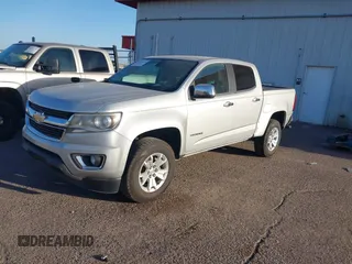 2017 Chevrolet Colorado 2WD LT z VIN 1GCGSCEN1H1272934, wystawiony jako IAAI lot #42046614 z przebiegiem 96 692 mil mil oraz . Historia ofert i sprzedaży dostępna na DreamBid. Obrazek 2.