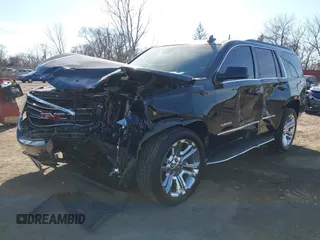 2016 GMC Yukon SLT with VIN 1GKS2BKC5GR253038, listed as a IAAI auction lot 41790030 with 101,039 mi miles. Bid and sale history available at carsss.com. Image 17.