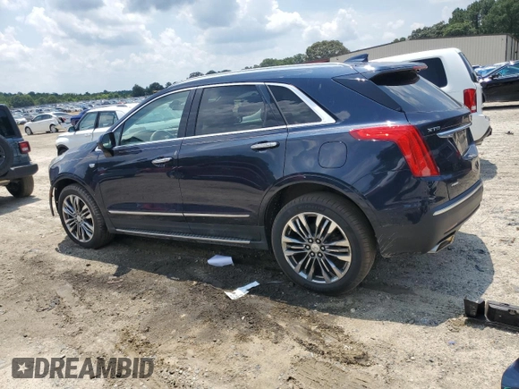 2017 Cadillac XT5 Premium Luxury AWD with VIN 1GYKNERS0HZ239805, listed as a Copart auction lot 61257435 with 104,448 mi miles and Salvage title. Bid and sale history available at DreamBid. Image 2.
