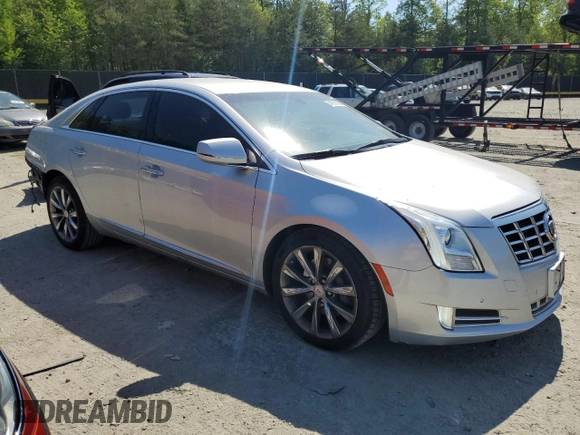 2013 Cadillac XTS Luxury с VIN 2G61P5S3XD9189744, выставлен на аукционе Copart как лот 54391535 с пробегом 132 841 миль миль и Списание • Salvage title. История ставок и продаж доступна на DreamBid. Изображение 4.
