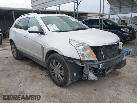 2015 Cadillac SRX Luxury Collection z VIN 3GYFNBE31FS552323, wystawiony jako IAAI lot #41553081 z przebiegiem 91 214 mil mil oraz . Historia ofert i sprzedaży dostępna na DreamBid. Obrazek 1.