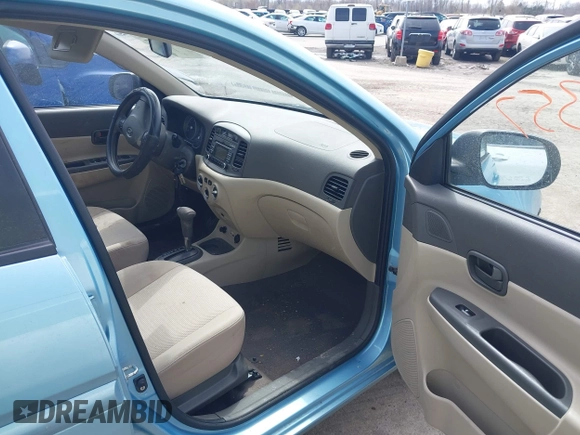 2010 Hyundai Accent GLS with VIN KMHCN4AC4AU427993, listed as a IAAI auction lot 42006357 with 208,298 mi miles. Bid and sale history available at carsss.com. Image 5.