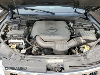 2011 Jeep Grand Cherokee Laredo with VIN 1J4RR4GGXBC567450, listed as a Copart auction lot 60056085 with 165,077 mi miles and Salvage title. Bid and sale history available at DreamBid. Image 11.