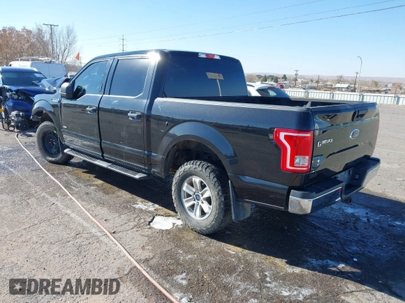 2015 Ford F-150 XLT with VIN 1FTEW1EP0FFC39327, listed as a IAAI auction lot 41012296 with 198,611 mi miles. Bid and sale history available at carsss.com. Image 3.