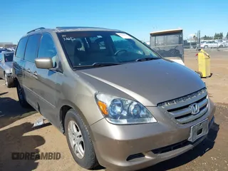 2007 Honda Odyssey EX-L z VIN 5FNRL38777B438009, wystawiony jako IAAI lot #41684475 z przebiegiem 190 925 mil mil oraz . Historia ofert i sprzedaży dostępna na DreamBid. Obrazek 1.