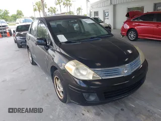 2009 Nissan Versa 1.8 S with VIN 3N1BC11E79L368680, listed as a IAAI auction lot 42090230 with 190,049 mi miles. Bid and sale history available at carsss.com. Image 6.