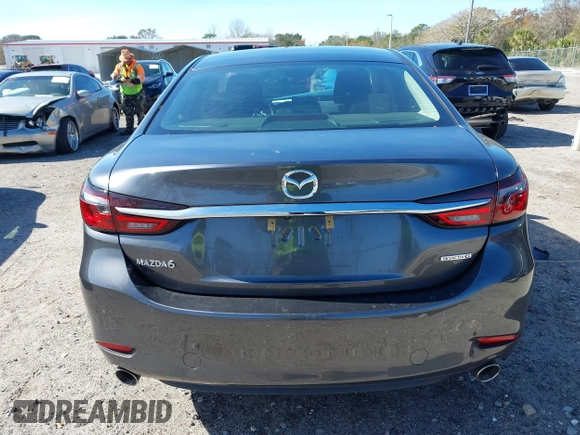 2020 Mazda 6 Sport with VIN JM1GL1UM7L1527203, listed as a IAAI auction lot 41378087 with 57,174 mi miles and . Bid and sale history available at DreamBid. Image 16.