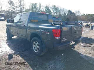 2012 Nissan Titan SV with VIN 1N6BA0ECXCN323520, listed as a IAAI auction lot 41195950 with 172,242 mi miles. Bid and sale history available at carsss.com. Image 3.