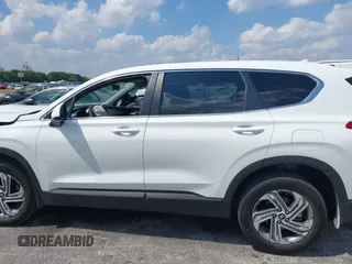 2023 Hyundai Santa Fe SE z VIN 5NMS14AJ6PH631267, wystawiony jako IAAI lot #42053761 z przebiegiem 17 880 mil mil oraz . Historia ofert i sprzedaży dostępna na DreamBid. Obrazek 14.