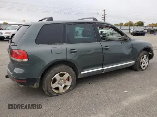 2004 Volkswagen Touareg with VIN WVGCM67L04D027410, listed as a Copart auction lot 79044964 with 100,509 mi miles and Salvage title. Bid and sale history available at DreamBid. Image 3.
