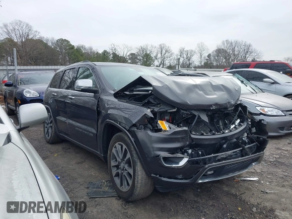 2017 Jeep Grand Cherokee Overland with VIN 1C4RJFCG8HC772837, listed as a IAAI auction lot 41304895 with 71,338 mi miles. Bid and sale history available at carsss.com. Image 1.