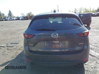 2019 Mazda CX-5 Grand Touring with VIN JM3KFBDM3K1677208, listed as a IAAI auction lot 41929299 with 58,163 mi miles. Bid and sale history available at carsss.com. Image 16.