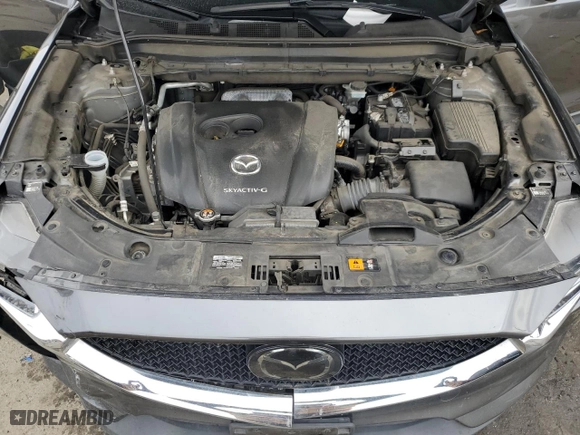 2020 Mazda CX-5 Touring with VIN JM3KFACM6L0797748, listed as a Copart auction lot 44573645 with 104,094 mi miles and Salvage Title. Bid and sale history available at carsss.com. Image 14.