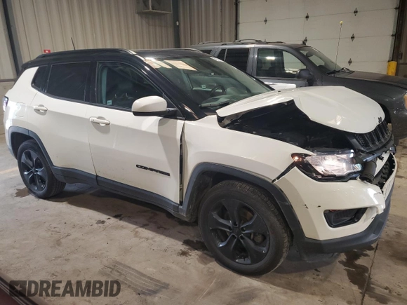 2020 Jeep Compass Latitude with VIN 3C4NJDBB1LT157875, listed as a Copart auction lot 60310155 with 81,817 mi miles and Salvage title. Bid and sale history available at DreamBid. Image 4.