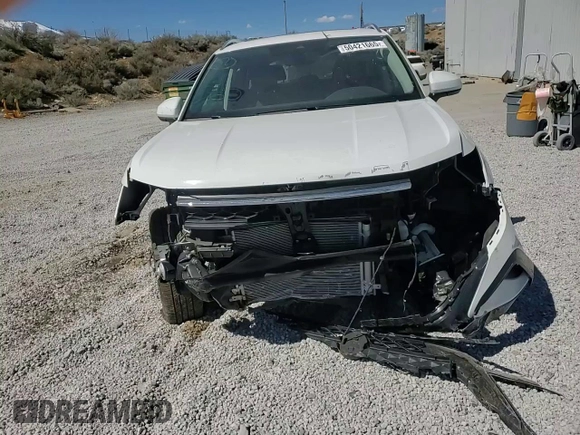 2024 Volkswagen Taos SE z VIN 3VVVX7B22RM047874, wystawiony jako Copart lot #50421665 z przebiegiem 4 744 mil mil oraz Szkoda całkowita • Salvage title. Historia ofert i sprzedaży dostępna na DreamBid. Obrazek 11.