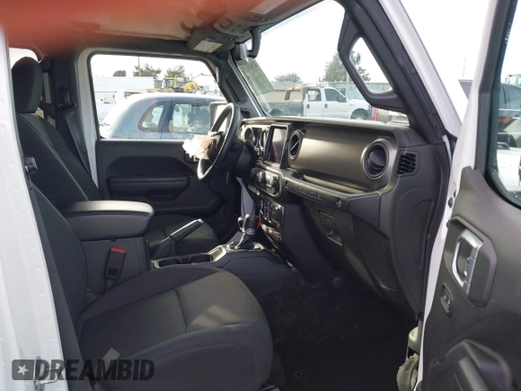 2023 Jeep Wrangler Sport with VIN 1C4HJXDG4PW567027, listed as a IAAI auction lot 41633197 with 14,782 mi miles and . Bid and sale history available at DreamBid. Image 5.
