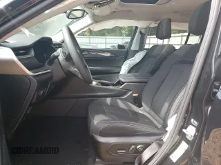 2023 Jeep Grand Cherokee Laredo with VIN 1C4RJGAG0PC534682, listed as a Copart auction lot 56981675 with 16,749 mi miles and Salvage title. Bid and sale history available at DreamBid. Image 7.