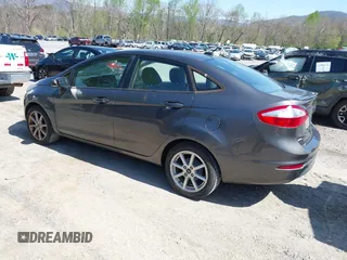 2015 Ford Fiesta SE with VIN 3FADP4BJ6FM105731, listed as a IAAI auction lot 41994903 with 150,189 mi miles. Bid and sale history available at carsss.com. Image 3.