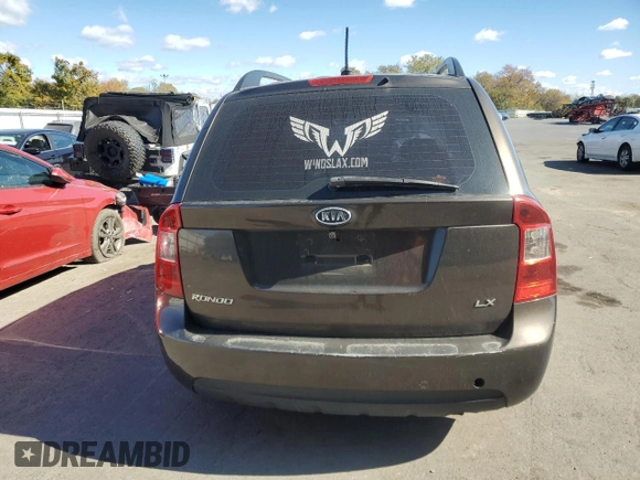 2009 Kia Rondo LX Base with VIN KNAFG528497260778, listed as a Copart auction lot 76497534 with 276,585 mi miles and Salvage Title. Bid and sale history available at carsss.com. Image 6.